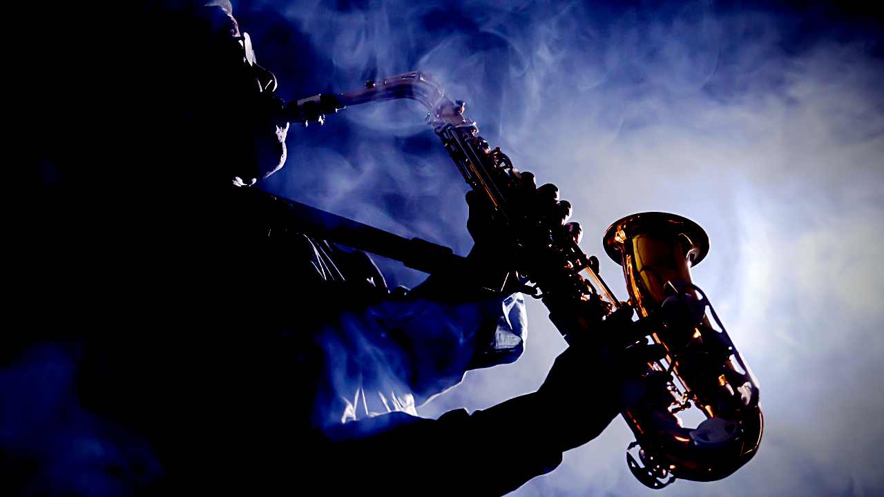 A saxophonist plays the alto sax